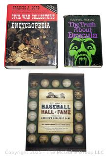 Three (3) Books Including Civil War Collectors Encyclopedia, Bert Sugar’s Baseball Hall of Fame and The Truth About Dracula (Note: 2/5/25 This lot was updated and now only includes 3 books)