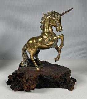 Metal Unicorn statue on wood base