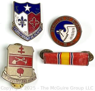 Collection including DUI Pin of 317th Engineer Battalion of the US Army, Crest Pin for the 141 Infantry Regiment of the Texas Army National Guard, and DUI WWII Era Army Services of Supply Badge