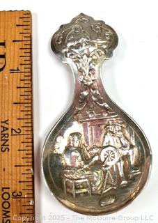 Dutch 833 Sterling Silver Repousse Decorative Serving Spoon. Circa 1927. 18 grams