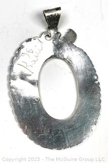 Sterling Silver Open Work Oval Pendant with Aztec Design, Made in Mexico and Signed by Artist. 