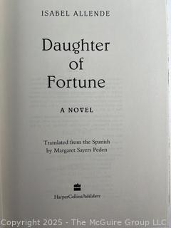 Four (4) Hard Cover Books with Dust Jackets Including "Daughter of Fortune" and First Edition of "A Bright Shining Lie"