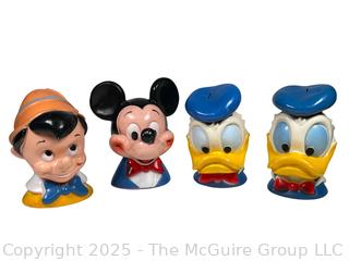 Four (4) Walt Disney Coin Piggy Banks in the Shape of Pinocchio, Mickey Mouse and Donald