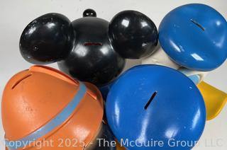 Four (4) Walt Disney Coin Piggy Banks in the Shape of Pinocchio, Mickey Mouse and Donald