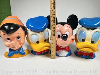 Four (4) Walt Disney Coin Piggy Banks in the Shape of Pinocchio, Mickey Mouse and Donald