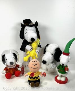 Group of Peanuts and Snoopy Plush Toys