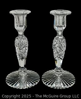 Pair of Cut Crystal Candlesticks. Small chip in base.  9" tall.