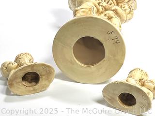 Three (3) Piece Pottery Candle Holders and Vase with Cherubs 