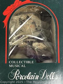 Three (3) Musical Dolls.  New in Original Boxes