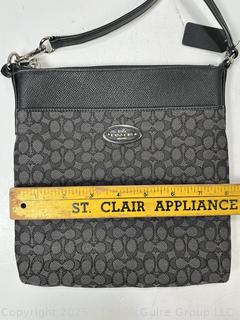 Coach Black Signature Courier Crossbody Handbag, New Without Tags.