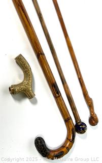 Three (3) Canes, Walking Sticks and Converted Umbrella,Plus a Brass Cane Top.
