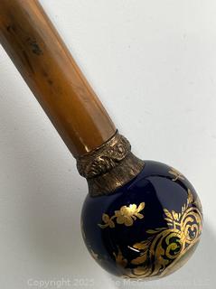 Three (3) Canes, Walking Sticks and Converted Umbrella,Plus a Brass Cane Top.