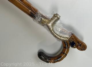 Three (3) Canes, Walking Sticks and Converted Umbrella,Plus a Brass Cane Top.