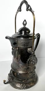 C 1850's Victorian Silver Plated Tilting Water Pitcher and Stand. Measures 22" Tall with Handle Up