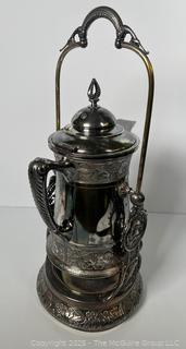C 1850's Victorian Silver Plated Tilting Water Pitcher and Stand. Measures 22" Tall with Handle Up