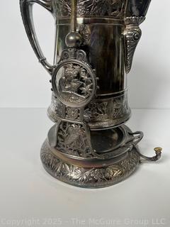 C 1850's Victorian Silver Plated Tilting Water Pitcher and Stand. Measures 22" Tall with Handle Up