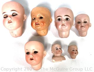 Seven (7) Porcelain Doll Heads