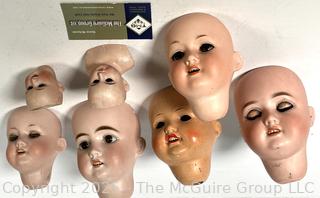 Seven (7) Porcelain Doll Heads