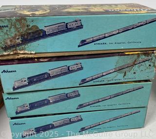 Four (4) Athearns HO scale model train cars in original boxes.