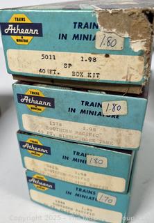 Four (4) Athearns HO scale model train cars in original boxes.