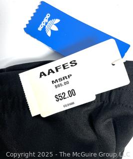 Women's Black & White Stripe Knit Track Pants by Adidas, Large.  New with Tags