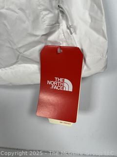 Women's White Rain Jacket by The North Face, Large. New with Tags
