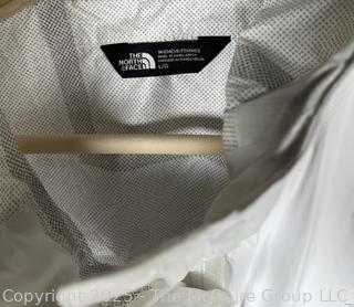 Women's White Rain Jacket by The North Face, Large. New with Tags