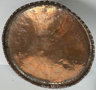 Large Hammered Metal Tray with Ornamental Designs. Measures 22" D