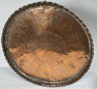 Large Hammered Metal Tray with Ornamental Designs. Measures 22" D