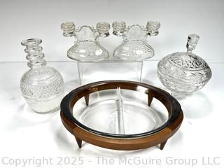 ????????????????? Two section serving dish in MCM Teak footed server; Pair of Vintage Crystal Double Taper Candle Holders; Crystal Decanter and Lidded Bowl