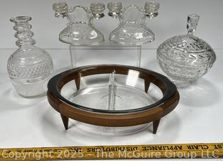 ????????????????? Two section serving dish in MCM Teak footed server; Pair of Vintage Crystal Double Taper Candle Holders; Crystal Decanter and Lidded Bowl