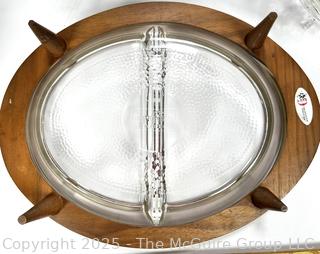 ????????????????? Two section serving dish in MCM Teak footed server; Pair of Vintage Crystal Double Taper Candle Holders; Crystal Decanter and Lidded Bowl