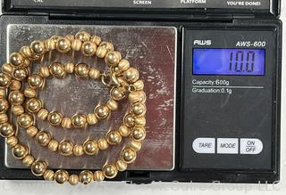 14KT Yellow Gold Hollow Bead Necklace on Chain 18" Long.  9.9 grams. 
