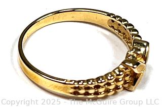 14KT Yellow Gold Kiss Ring Beverly Hills Gold.  2 grams.