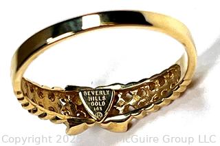 14KT Yellow Gold Kiss Ring Beverly Hills Gold.  2 grams.