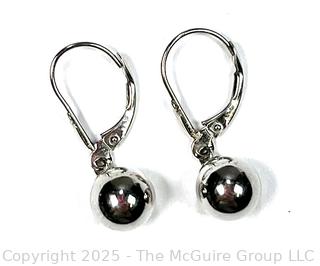 14KT White Gold Bead Dangle Earrings. .01 grams.