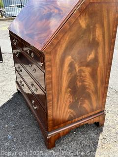Maitland-Smith George III Style Diminutive Slant-Front Secretary Desk.  Missing hardware and small edge of veneer.  