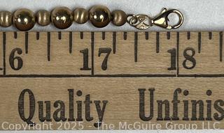 14KT Yellow Gold Hollow Bead Necklace on Chain 18" Long.  9.9 grams. 