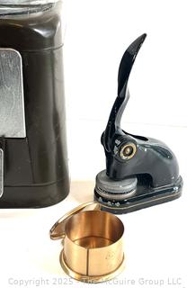 Desk stamp dispenser/scale; coin operated vending machine; and seal embossing stamper