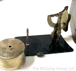 Desk stamp dispenser/scale; coin operated vending machine; and seal embossing stamper