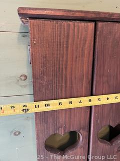 Primitive knotty pine cabinet with doors and towel rack 
