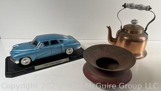 Odd Trio: Model Die Cast Car 1948 Tucker Torpedo. American; Spittoon; and Copper tea kettle w/ porcelain accents