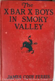 Six (6) Vintage Childrens Books Including Xbar Xboys in Smoky Falley, The Westerners, and Land of the Lost Dolls