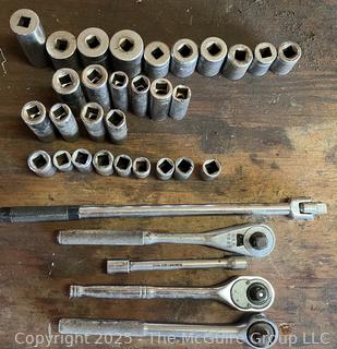 Grouping of Bench Tools Including Rachets and Sockets