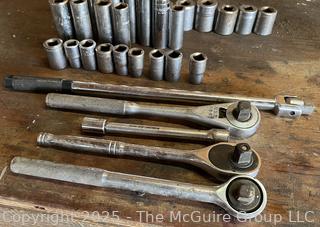Grouping of Bench Tools Including Rachets and Sockets