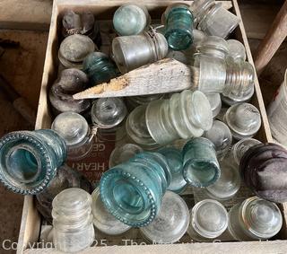 Group of antique glass insulators: various brands and colors