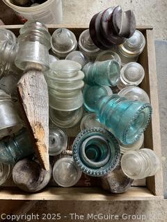 Group of antique glass insulators: various brands and colors