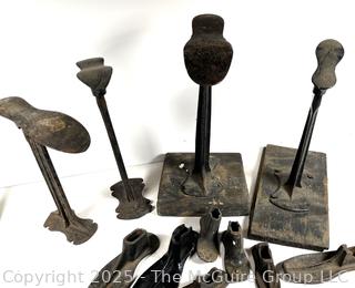 Collection of antique iron shoe cobbler accessories 