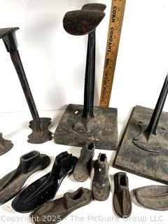 Collection of antique iron shoe cobbler accessories 
