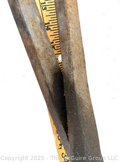 Large, forged iron clipping tool